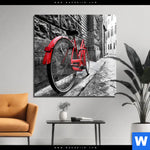 Acrylglasbild Rotes Fahrrad In Gasse Quadrat Produktvorschau mit dem Bild Rotes Fahrrad in Gasse im Format Quadrat.