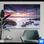 Acrylglasbild Sonnenaufgang Am Strand Mit Felsen Querformat Produktvorschau mit dem Bild Sonnenaufgang am Strand mit Felsen im Format Querformat.