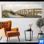 Aluminiumbild Gebürstet Holzsteg Duenen Panorama Produktvorschau mit dem Bild Holzsteg & Dünen im Format Panorama.