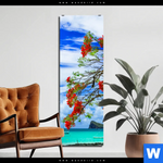 Aluminiumbild Gebürstet Rote Blueten Und Tuerkisfarbenes Meer Schmal Produktvorschau mit dem Bild Rote Blüten und Türkisfarbenes Meer im Format Schmal.