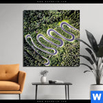 Aluminiumbild Gebürstet Wald Strasse Luftaufnahme Quadrat Produktvorschau mit dem Bild Wald & Straße Luftaufnahme im Format Quadrat.