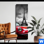 Leinwandbild Eiffelturm Rotes Auto Schmal Produktvorschau mit dem Bild Eiffelturm & Rotes Auto im Format Schmal.