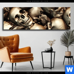 Leinwandbild Goldene Schaedel Panorama Produktvorschau mit dem Bild Goldene Schädel im Format Panorama.