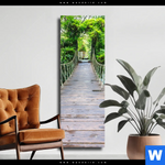 Leinwandbild Haengebruecke Im Dschungel Schmal Produktvorschau mit dem Bild Hängebrücke im Dschungel im Format Schmal.