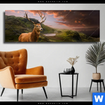 Leinwandbild Hirsch In Gebirgslandschaft Panorama Produktvorschau mit dem Bild Hirsch in Gebirgslandschaft im Format Panorama.