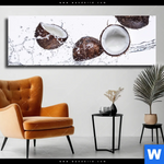 Leinwandbild Kokosnuesse Mit Wasserspritzer Panorama Produktvorschau mit dem Bild Kokosnüsse mit Wasserspritzer im Format Panorama.
