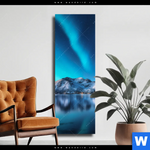 Leinwandbild Nordlichter Und Schneebedeckte Berge Schmal Produktvorschau mit dem Bild Nordlichter und schneebedeckte Berge im Format Schmal.