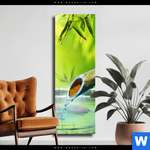 Leinwandbild Orchidee Im Japanischer Brunnen Schmal Produktvorschau mit dem Bild Orchidee im japanischer Brunnen im Format Schmal.