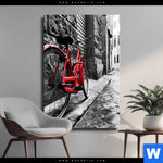 Leinwandbild Rotes Fahrrad In Gasse Hochformat Produktvorschau mit dem Bild Rotes Fahrrad in Gasse im Format Hochformat.