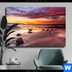 Leinwandbild Sonnenuntergang Am Strand Mit Felsen Querformat Produktvorschau mit dem Bild Sonnenuntergang am Strand mit Felsen im Format Querformat.