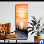 Leinwandbild Sonnenuntergang Mit Duene Und Meer Schmal Produktvorschau mit dem Bild Sonnenuntergang mit Düne und Meer im Format Schmal.