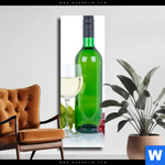 Leinwandbild Wein In Flaschen Und Glaesern Schmal Produktvorschau mit dem Bild Wein in Flaschen und Gläsern im Format Schmal.