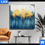 Leuchtbild Abstrakter Wald Blau Gold Quadrat Produktvorschau mit dem Bild Abstrakter Wald - Blau & Gold im Format Quadrat.