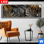 Leuchtbild Dia Palmenblaetter Schwarz Gold Panorama Produktvorschau mit dem Bild Palmenblätter Schwarz Gold im Format Panorama.
