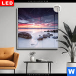 Leuchtbild Dia Sonnenaufgang Am Strand Mit Felsen Quadrat Produktvorschau mit dem Bild Sonnenaufgang am Strand mit Felsen im Format Quadrat.