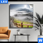 Leuchtbild Holztreppe Auf Berg Mit Wolken Quadrat Produktvorschau mit dem Bild Holztreppe auf Berg mit Wolken im Format Quadrat.