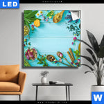 Leuchtbild Kraeuter Auf Blauem Holztisch Quadrat Produktvorschau mit dem Bild Kräuter auf blauem Holztisch im Format Quadrat.