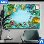 Leuchtbild Kraeuter Auf Blauem Holztisch Querformat Produktvorschau mit dem Bild Kräuter auf blauem Holztisch im Format Querformat.