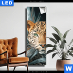 Leuchtbild Leopard Zwischen Blaettern Schmal Produktvorschau mit dem Bild Leopard zwischen Blättern im Format Schmal.