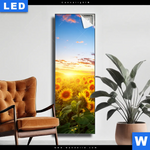 Leuchtbild Leuchtend Gelbe Sonnenblumen Am Abend Schmal Produktvorschau mit dem Bild Leuchtend gelbe Sonnenblumen am Abend im Format Schmal.