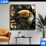 Leuchtbild Monstera Und Tukan Gold Quadrat Produktvorschau mit dem Bild Monstera und Tukan Gold im Format Quadrat.