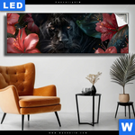 Leuchtbild Panther Und Rote Blueten Panorama Produktvorschau mit dem Bild Panther und rote Blüten im Format Panorama.