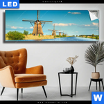 Leuchtbild Romantik Zwischen Windmuehlen Panorama Produktvorschau mit dem Bild Romantik zwischen Windmühlen im Format Panorama.