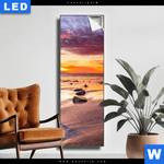 Leuchtbild Sonnenuntergang Am Strand Mit Felsen Schmal Produktvorschau mit dem Bild Sonnenuntergang am Strand mit Felsen im Format Schmal.
