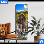 Leuchtbild Waldhuette Am Fluss Schmal Produktvorschau mit dem Bild Waldhütte am Fluss im Format Schmal.