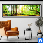 Poster Idyllischer Wald Bei Sonnenaufgang Panorama Produktvorschau mit dem Bild Idyllischer Wald bei Sonnenaufgang im Format Panorama.