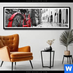 Poster Rotes Fahrrad In Gasse Panorama Produktvorschau mit dem Bild Rotes Fahrrad in Gasse im Format Panorama.