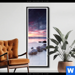 Poster Sonnenaufgang Am Strand Mit Felsen Schmal Produktvorschau mit dem Bild Sonnenaufgang am Strand mit Felsen im Format Schmal.