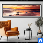 Poster Sonnenuntergang Am Strand Mit Felsen Panorama Produktvorschau mit dem Bild Sonnenuntergang am Strand mit Felsen im Format Panorama.