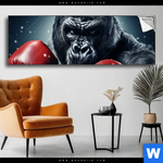 Spannbild Gorilla Mit Roten Boxhandschuhen Panorama Produktvorschau mit dem Bild Gorilla mit roten Boxhandschuhen im Format Panorama.