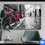 Spannbild Rotes Fahrrad In Gasse Querformat Produktvorschau mit dem Bild Rotes Fahrrad in Gasse im Format Querformat.