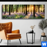 Wechselmotiv Bluehender Wald Bei Sonnenaufgang Panorama Produktvorschau mit dem Bild Blühender Wald bei Sonnenaufgang im Format Panorama.