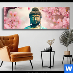 Wechselmotiv Buddha Statue Mit Kirschblueten Panorama Produktvorschau mit dem Bild Buddha Statue mit Kirschblüten im Format Panorama.