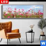 Wechselmotiv Dia Blumenwiese Bei Strahlend Blauem Himmel Panorama Produktvorschau mit dem Bild Blumenwiese bei strahlend blauem Himmel im Format Panorama.
