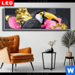Wechselmotiv Dia Exotischer Tukan Mit Blueten Panorama Produktvorschau mit dem Bild Exotischer Tukan mit Blüten im Format Panorama.