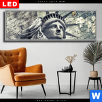 Wechselmotiv Dia Freiheitsstatue Im Sandsturm Panorama Produktvorschau mit dem Bild Freiheitsstatue im Sandsturm im Format Panorama.