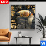 Wechselmotiv Dia Monstera Und Tukan Gold Quadrat Produktvorschau mit dem Bild Monstera und Tukan Gold im Format Quadrat.