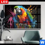 Wechselmotiv Dia Papagei Mit Bunten Farbspritzern Querformat Produktvorschau mit dem Bild Papagei mit bunten Farbspritzern im Format Querformat.