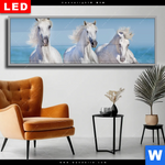 Wechselmotiv Dia Pferdeherde Am Strand Panorama Produktvorschau mit dem Bild Pferdeherde am Strand im Format Panorama.