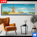 Wechselmotiv Dia Romantik Zwischen Windmuehlen Panorama Produktvorschau mit dem Bild Romantik zwischen Windmühlen im Format Panorama.