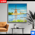 Wechselmotiv Dia Romantik Zwischen Windmuehlen Quadrat Produktvorschau mit dem Bild Romantik zwischen Windmühlen im Format Quadrat.