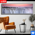 Wechselmotiv Dia Wasserfall Bei Abendroete Panorama Produktvorschau mit dem Bild Wasserfall bei Abendröte im Format Panorama.