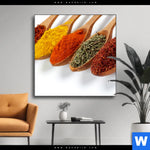 Wechselmotiv Farbige Gewuerze Auf Holzloeffel Quadrat Produktvorschau mit dem Bild Farbige Gewürze auf Holzlöffel im Format Quadrat.