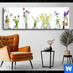 Wechselmotiv Glasvasen Mit Kraeutern Panorama Produktvorschau mit dem Bild Glasvasen mit Kräutern im Format Panorama.