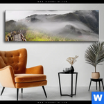 Wechselmotiv Holztreppe Auf Berg Mit Wolken Panorama Produktvorschau mit dem Bild Holztreppe auf Berg mit Wolken im Format Panorama.