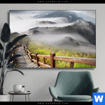 Wechselmotiv Holztreppe Auf Berg Mit Wolken Querformat Produktvorschau mit dem Bild Holztreppe auf Berg mit Wolken im Format Querformat.